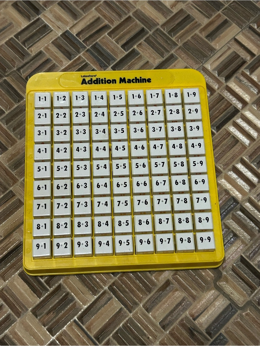 Yellow Addition Machine Learning Toy by Lakeshore